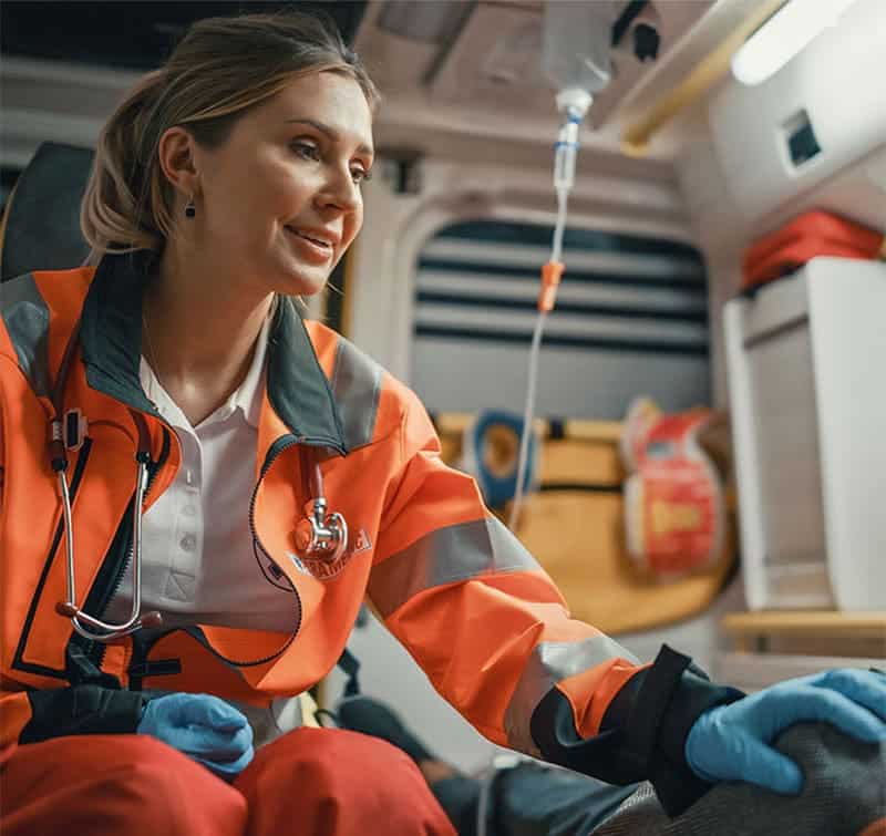 Paramedic in ambulance